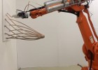 Large-Scale Rapid Prototyping Robots: Industrial Robot Arm Extruders and Building-Scale 3D Printers