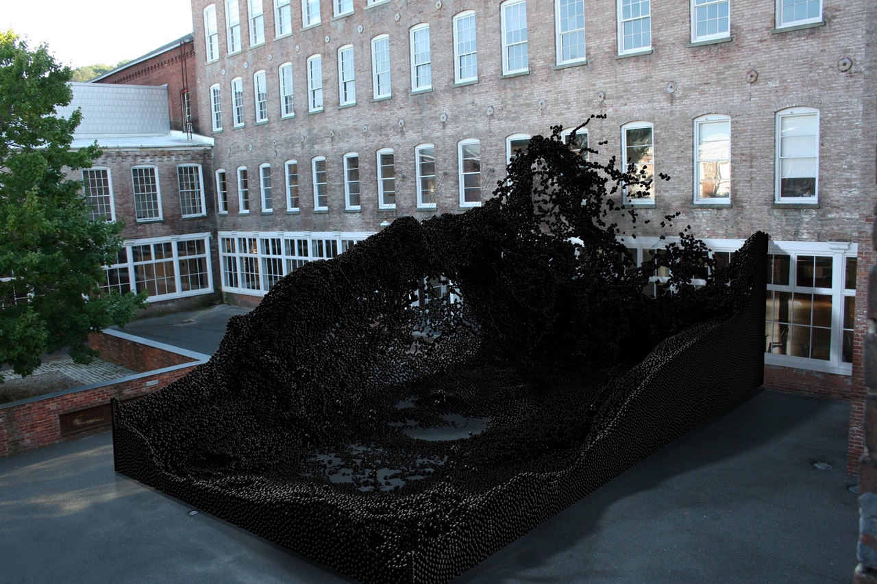 Robot assemble black ping pong balls