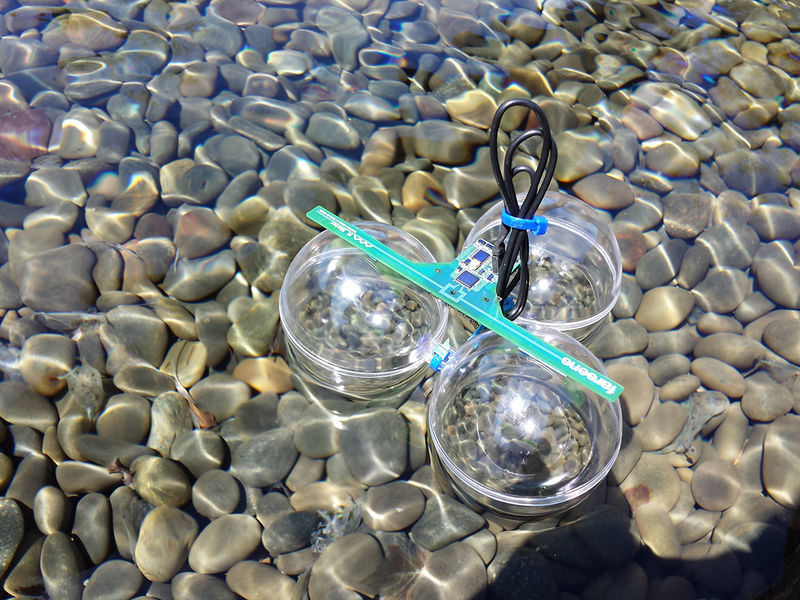 Drone reading sensor tag in water