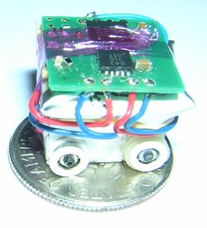 Pico the Micro Robot sitting on a dime