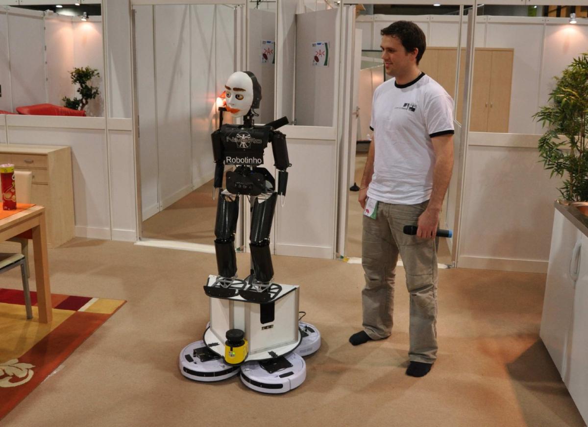 Robot Surfing on the Roomba QuadDrive Omnidirectional Mobile Robot Base