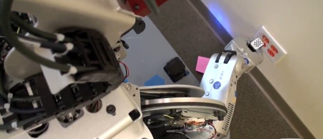 Willow Garage PR-2 Plugging Itself In