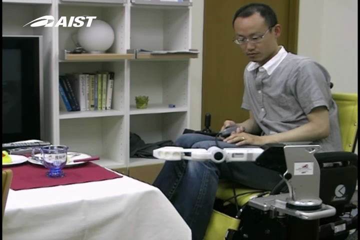 Telescoping Robot Arm mounted on Wheelchair Grasps Cup from Table