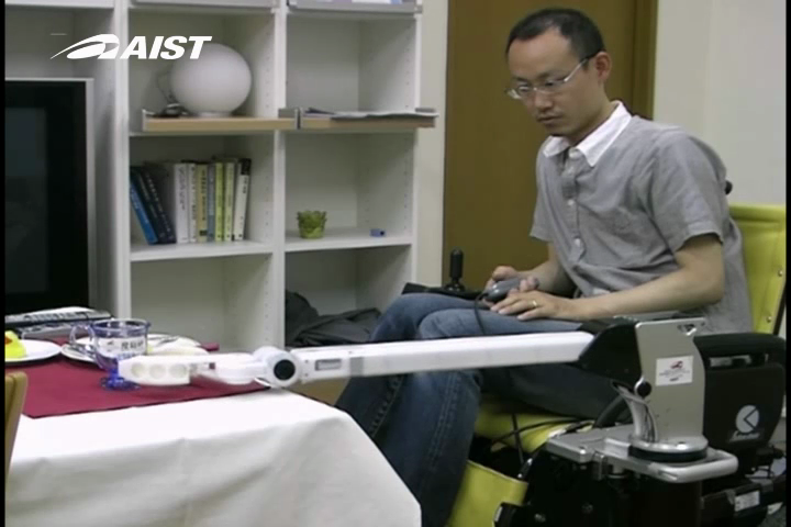 Telescoping Robot Arm mounted on Wheelchair Grasps Cup from Table