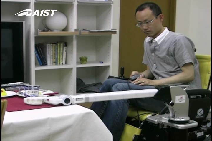 Telescoping Robot Arm mounted on Wheelchair Grasps Cup from Table