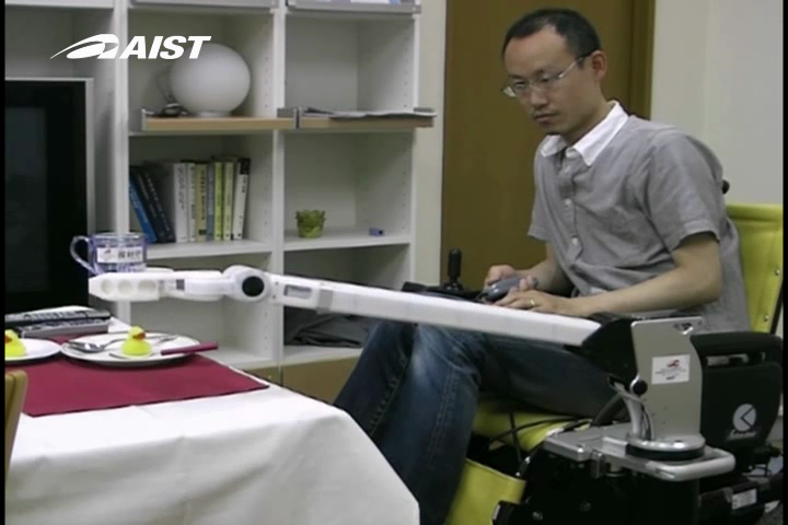 Telescoping Robot Arm mounted on Wheelchair Lifting a Cup for a Drink