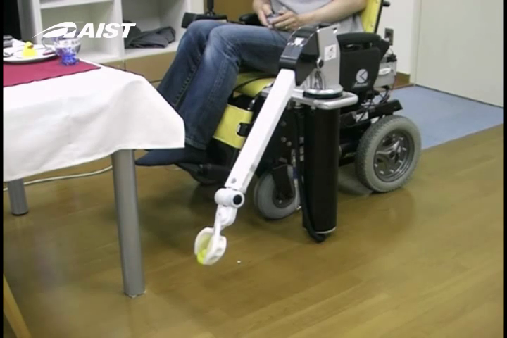 Telescoping Robot Arm mounted on Wheelchair Grasping Object on Floor